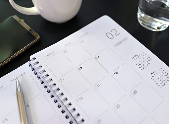calendar-planner-and-mobile-phone-on-desk-2021-09-28-08-02-27-utc-1